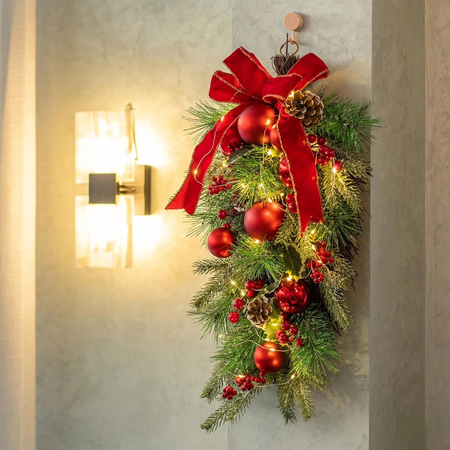 24" Pre-lit Decorative Teardrop Swag, Battery Operated Christmas Swag with Fairy Lights, Red Bowknot & Baubles, Pine Cones, Red Berries, Green Leaves Holly, Spruce Branches, Pine Needles (Red Bowknot)